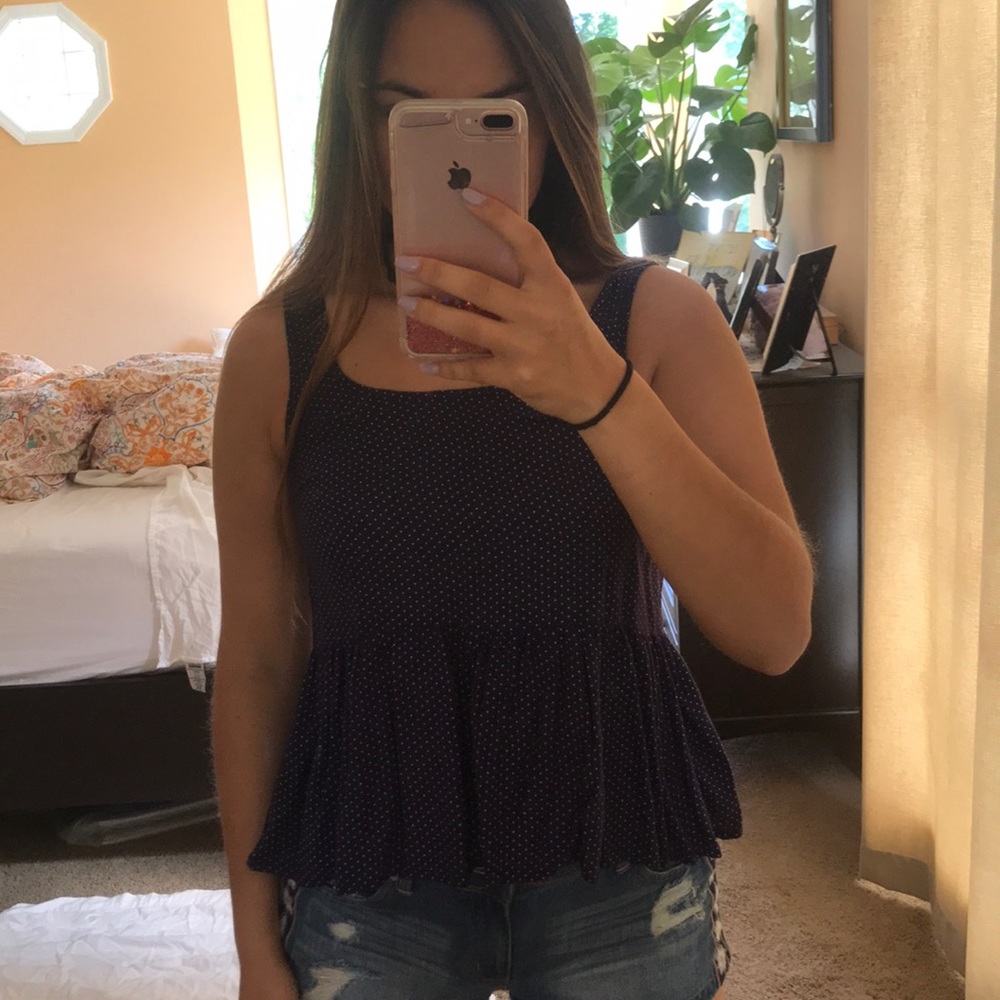 Cute flowy polka dot tank top.